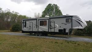 2017 wolfpack 325 pack 13 13 ft garage fits a 4 seat rzr 1.5 bath smart tv in living room. Wolfpack 325pack13 Forest River Forums