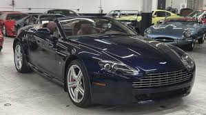Image result for Midnight Blue 2010 Aston Martin