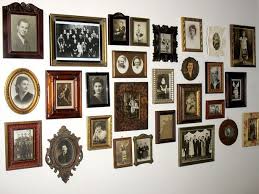 Gift shops sell wonderful (and expensive) art made from old photos, so commemorate anniversaries and birthdays with vintage images in frames or make easy, classy. Decorating Ideas For Family Pictures Family Photo Wall Photo Wall Gallery Family Pictures On Wall