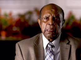 Ahead of Lee Elder taking