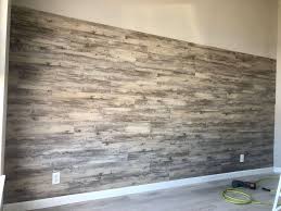 Diy Peel And Stick Vinyl Plank Accent Wall Plank Wall Bedroom Flooring On Walls Vinyl Plank
