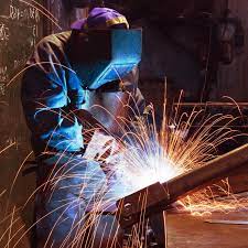 Welding Worker In Factory Industrial Worker In Welding Process Affiliate Factory Worker Welding Process Welding Photography Inspo Stock Photography