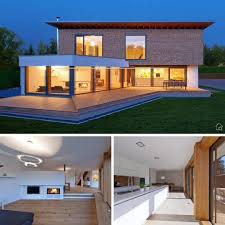 Einfamilienhaus Modern Mit Garage Pultdach Bauen Haus Design Ideen Mit Grundriss Holz Fassade Architecture House House Styles House Plans Australia