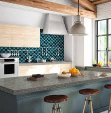 Textured blue tiles with complementary accent tiles in a standard rectangular shape make this kitchen backsplash a focal point for the space. Top 10 Blue Backsplash Tiles Guaranteed To Rock Your Design