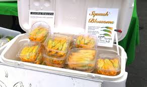 You will need a mandolin (affiliate link) fitted with adjustable thickness settings to cut the zucchini into thin 1/8th inch thick ribbons, it's quick and easy but please be careful you don't cut yourself. How To Freeze Zucchini Flowers