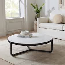 Due to the natural materials used, tile coloring ranges from bright white to light tan. Origami Coffee Table