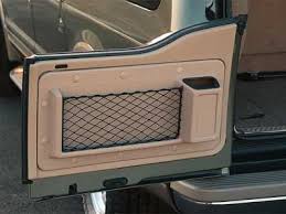 Custom Barn Door Storage From Fordparts Com Part 2c7z 7820130 Aa 123 87 425 821 6611 Ford Excursion Ford Excursion Diesel Cargo Storage