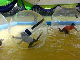 Zorb ball is also called big glass ball. Inflatable Pool With 5 Rolling Balls For Rent Allan Friends Studios