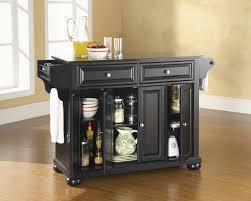 The stone's warm creamy background features brown and black flecks and veins. Fingerhut Crosley Alexandria Solid Black Granite Top Kitchen Island