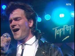 Patrick swayze is an innocent upbeat song that celebrates a love that's similarly seen in the 1987 romance/drama film dirty dancing. When Patrick Swayze Starts To Sing The Crowd Goes Quiet Then Goosebumps