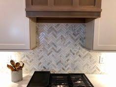 Wood is a common element among modern kitchen ideas and designs. Ruth Stimart Adamandruth Profile Pinterest