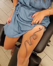 Well dressed cute animals owl and deer astonishingly applied on leg of a women with roses. 19 Attractive Thigh Tattoos For Women In 2021 Styles At Life