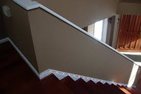 Attaching the top rail or banister at the end of a run of railing to the side of a house is not the problems that arise if someone tries to do this is that the screws going into the wall of the house are. Renovations Loudoun Stairs