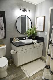 The bed has a pure white bedspread and an inviting beige checkered throw. 4 Tips For Creating A Budget Friendly Boho Farmhouse Bathroom Makeover