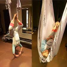 Aerial Yoga Everything You Need To Know About Yoga In The Air Lotsofyoga Aerial Yoga Anti Gravity Yoga Yoga Swing