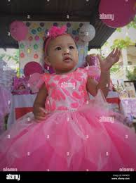 Cute Baby Girl Wearing Pink Dress Enjoying At Birthday Party Stock Photo Alamy