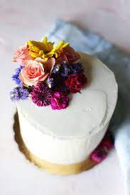 Birthday cake with fresh flowers on top. How To Decorate A Cake With Flowers