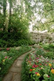 This Large Houston Shade Garden Features A Covered Deck And Patio Woodland Garden Shade Garden Houston Garden
