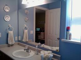 Installing one centerpiece amid smaller patches of mirrors is another way to decorate your bathroom without compromising on purpose. Bathroom Mirror Ideas Bathroom Remodel Ideas Badezimmerspiegel Rahmen Badezimmer Badezimmerspiegel