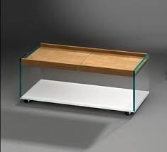 Find here online price details of companies selling designer coffee table. Buy Glass Coffee Table With Wood Classic Design Dreieck Design