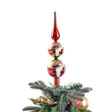 It tilts to make tree stand straight. Tree Topper Holder Village Lighting Company