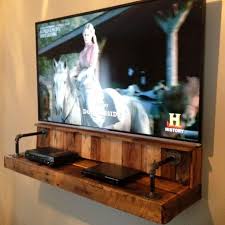 Building yourself a diy set of floating shelves is a fantastic way to remove the clutter in any room in this kitchen counter top and matching wooden floating shelves look fantastic. Pallet Projects And Pallet Furniture Ideas St1162019 Love This Flat Screen Tv Wall Shelf Made With Pallet Wood A Rustic Tv Stand Diy Furniture Pallet Furniture