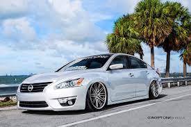 Jaw-dropping White Pearl Debadged Nissan Altima Customized To Amaze Nissan Altima Altima Nissan Altima Coupe