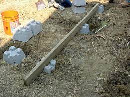 Place the deck frame onto the concrete blocks so the frame parts rest over the centers of the blocks. Best Type Of Concrete Deck Blocks Hgtv