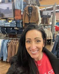 Four Feathers Boutique added a...