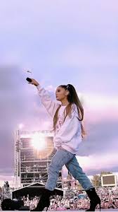 Ariana grande is easily one of the topnotch singers on the entire planet right now, thanks to her attractive appearance and stunning vocals her career has. Background Ariana Grande Wallpaper Enwallpaper