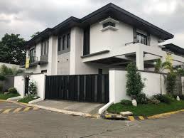 Design designed a modern shingle style home in minneapolis to incorporate garage doors that resemble the elegant wood designs of traditional carriage house doors. Best Ideas Of Outside Elevation Corner House Design