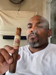 Would anyone know of a local cigar shop selling Cuban cigars ?