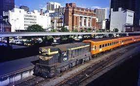 Vline Locomotive T341 In Classic Victorian Railways Blue And Gold Livery Hauls A Near New Set Of Bright Orange N Class Ca Model Railway Train Classic Victorian