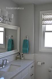 Our Tiny Bathroom Reno Reveal Shopping Guide Freelance Mama Grey Bathroom Tiles Small Bathroom Renos Home Decor