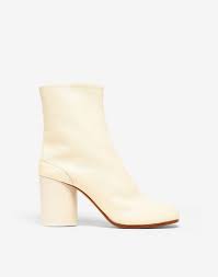 Champagne beige leather tabi ankle boots from maison margiela featuring tabi toe, concealed side fastening, low block heel and leather sole. Maison Margiela Tabi Vintage Leather Boots Women Maison Margiela Store