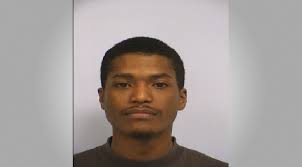 Murder suspect still at large