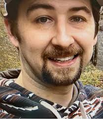 At a reunion in Buffalo Church, sometime in the late 90s; cousins Rebecca  (Gray) Triplett, and Floyd Nig Triplett. Sheriff Merideth back of them.