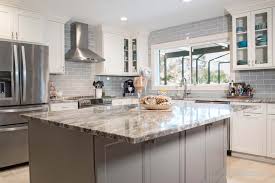 It S Hard To Beat A Good Two Toned Kitchen We Love This Gray And White Combo Kitchen Remodel Small Gray Subway Tile Backsplash Subway Tile Backsplash