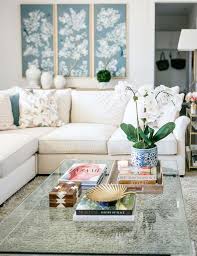The best tip for modern styled coffee tables is to form a grid. Coffee Table Styling 8 Tips For Styling Your Coffee Table Living Room Coffee Table Chinoiserie Living Room Table Decor Living Room