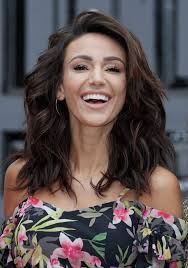 Michelle Keegan reveals her tanned legs as she launches new Very clothing  range