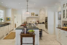 travertine flooring with white cabinets