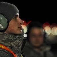 US Marine Corps (USMC) Corporal (CPL) Brian Sabo, 3rd Light Armored  Reconnaissance (LAR) Battalion, wears the moving map display goggles as he  operates the wearable ground control station for the Dragon Eye