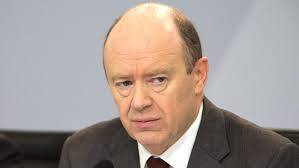 Deutsche Bank shares slide as John Cryan hints of 'small loss'