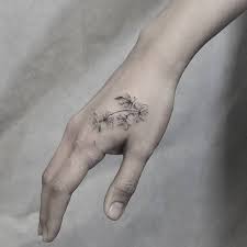 Fine Line Style Cherry Blossoms Tattoo On The Right Hand Tattoo Artist Kane Navasard Small Hand Tattoos Hand Tattoos Cherry Blossom Tattoo