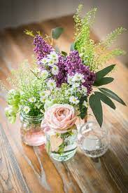 Pretty Simple Rustic Flower Arrangement Rustic Flower Arrangements Wedding Centerpieces Wedding Flowers