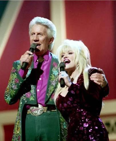 Porter Wagoner and Dolly Parton perform at Grand Ole Opry