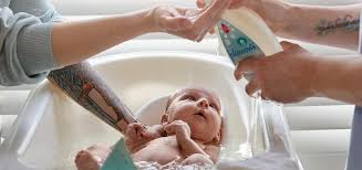 It's easier if someone else holds your baby while you get in and out of the bath. How To Bathe Your Baby Johnson S Baby Uk