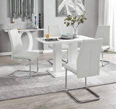 Only £79.99 folding table and chair set. Furniturebox Uk Imperia Modern White High Gloss Dining Table And 4 Lorenzo Chrome Leather Dining Chairs Set White Table White Lorenzo Chairs Buy Online In Bahamas At Bahamas Desertcart Com Productid 100802272