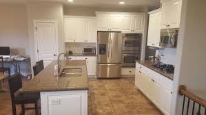 Knotty Alder Kitchen Cabinets Refinished In Sherwin Williams Pure White Refinished By Chameleon Pai Refinishing Cabinets Alder Kitchen Cabinets Alder Cabinets