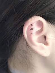 45 Ear Tattoo Ideas For Your Next Ink Ear Tattoo Cosmic Tattoo Tattoos